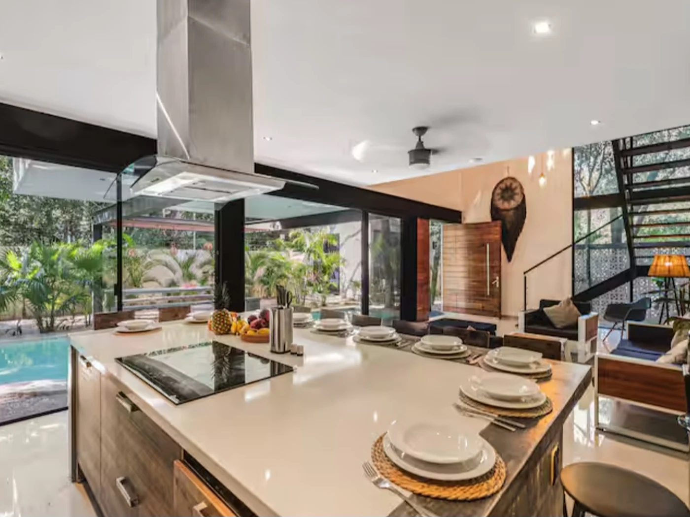Open kitchen and living space looking onto the pool